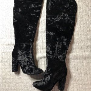 Thigh high heeled boots